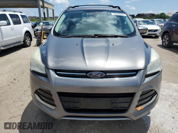2013 Ford Escape SEL with VIN 1FMCU0HX2DUB77937, listed as a Copart auction lot 55948845 with 137,000 mi miles and Clean Title. Bid and sale history available at DreamBid. Image 5.