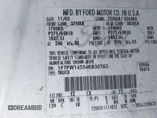 2004 Ford F-150 XLT with VIN 1FTPW14554KB30763, listed as a IAAI auction lot 41691684 with 200,618 mi miles. Bid and sale history available at carsss.com. Image 9.