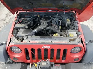 2007 Jeep Wrangler Unlimited Rubicon with VIN 1J4GA69177L102392, listed as a Copart auction lot 53195215 with 166,296 mi miles and Salvage title. Bid and sale history available at DreamBid. Image 12.
