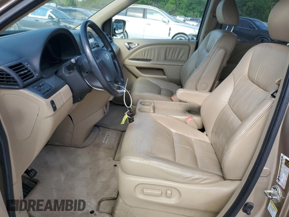 2007 Honda Odyssey EX-L z VIN 5FNRL38607B418045, wystawiony jako Copart lot #51469885 z przebiegiem 180 108 mil mil oraz Szkoda całkowita • Salvage title. Historia ofert i sprzedaży dostępna na DreamBid. Obrazek 7.