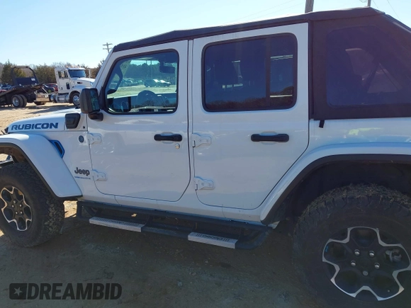 2023 Jeep Wrangler Rubicon with VIN 1C4JJXR64PW586369, listed as a IAAI auction lot 41587561 with 16,038 mi miles and . Bid and sale history available at DreamBid. Image 15.