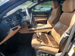 2012 BMW 7 Series 750Li с VIN WBAKB8C56CDX21023, выставлен на аукционе Copart как лот 61988955 с пробегом 145 022 миль миль и Списание • Salvage title. История ставок и продаж доступна на DreamBid. Изображение 7.