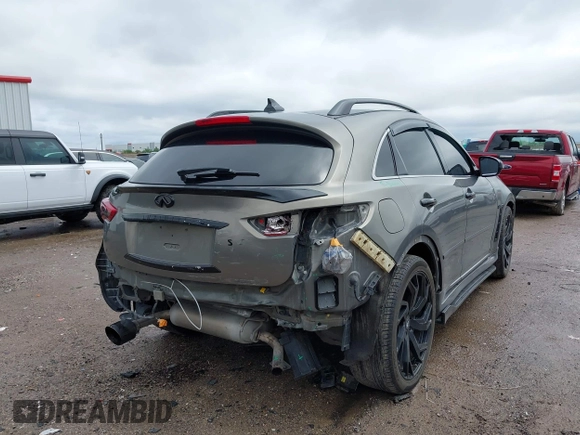 2014 Infiniti QX70 z VIN JN8CS1MU3EM451745, wystawiony jako IAAI lot #42203922 z przebiegiem 144 990 mil mil oraz . Historia ofert i sprzedaży dostępna na DreamBid. Obrazek 4.