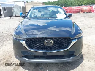 2023 Mazda CX-5 S Carbon Edition z VIN JM3KFBCMXP0201665, wystawiony jako IAAI lot #39965378 z przebiegiem 29 105 mil mil oraz . Historia ofert i sprzedaży dostępna na DreamBid. Obrazek 12.