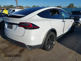 2022 Tesla Model X with VIN 7SAXCBE59NF364984, listed as a IAAI auction lot 41809256 with Not Provided miles and . Bid and sale history available at DreamBid. Image 4.