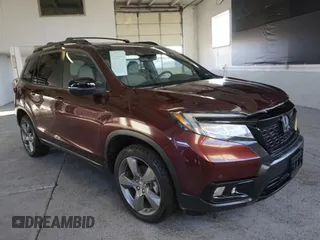 2020 Honda Passport Touring with VIN 5FNYF8H9XLB002041, listed as a Copart auction lot 44206975 with 39,475 mi miles and Salvage Title. Bid and sale history available at carsss.com. Image 1.