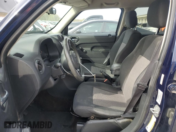 2014 Jeep Patriot Altitude with VIN 1C4NJPBA1ED689841, listed as a Copart auction lot 53427925 with 168,601 mi miles and Salvage title. Bid and sale history available at DreamBid. Image 7.