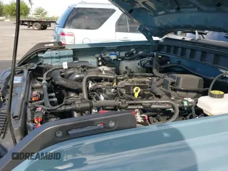 2023 Ford Bronco z VIN 1FMDE5BH2PLA98570, wystawiony jako IAAI lot #42322165 z przebiegiem 10 266 mil mil oraz . Historia ofert i sprzedaży dostępna na DreamBid. Obrazek 20.