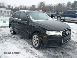 2017 Audi Q3 Premium Plus z VIN WA1JCCFS5HR000986, wystawiony jako IAAI lot #41471543 z przebiegiem 68 087 mil mil oraz . Historia ofert i sprzedaży dostępna na DreamBid. Obrazek 6.