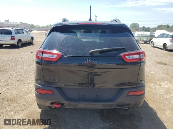 2016 Jeep Cherokee Trailhawk with VIN 1C4PJMBS5GW179046, listed as a Copart auction lot 61677425 with 88,694 mi miles and Salvage title. Bid and sale history available at DreamBid. Image 6.