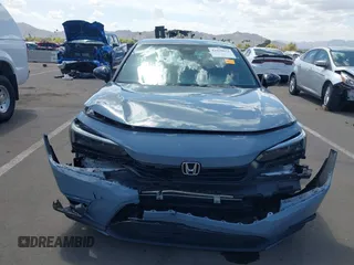 2022 Honda Civic Sport with VIN 2HGFE2F50NH600791, listed as a IAAI auction lot 41939672 with 42,974 mi miles. Bid and sale history available at carsss.com. Image 6.