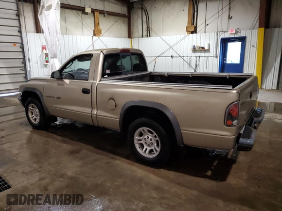 2002 Dodge Dakota with VIN 1B7FL16X82S590323, listed as a Copart auction lot 85287884 with 61,722 mi miles and Salvage Title. Bid and sale history available at carsss.com. Image 2.