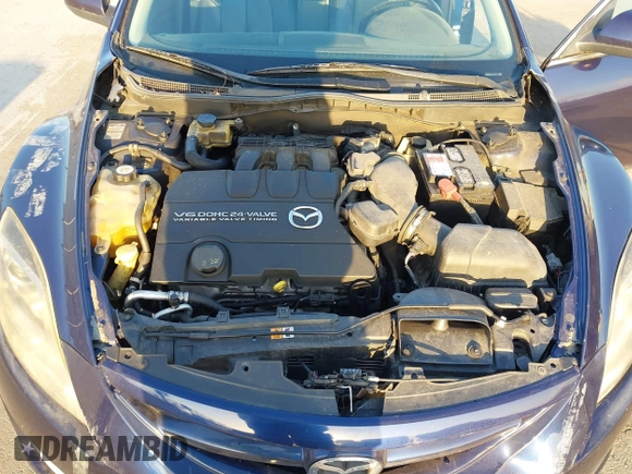 2009 Mazda 6 S Grand Touring with VIN 1YVHP82BX95M21357, listed as a IAAI auction lot 42013043 with 119,701 mi miles and . Bid and sale history available at DreamBid. Image 10.