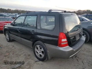 2003 Subaru Forester XS with VIN JF1SG65623H724854, listed as a Copart auction lot 82579774 with 176,986 mi miles and Salvage Title. Bid and sale history available at carsss.com. Image 2.