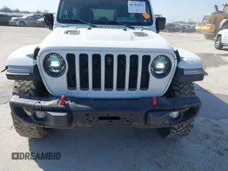 2021 Jeep Wrangler Unlimited Rubicon with VIN 1C4HJXFG7MW531678, listed as a IAAI auction lot 41781874 with 32,440 mi miles and . Bid and sale history available at DreamBid. Image 6.