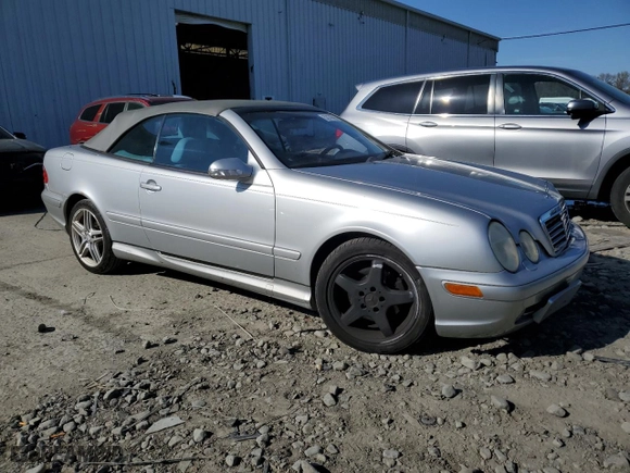 2003 Mercedes-Benz CLK-Class 4.3L with VIN WDBLK70G13T133977, listed as a Copart auction lot 52279065 with 130,459 mi miles and Salvage Title. Bid and sale history available at carsss.com. Image 4.