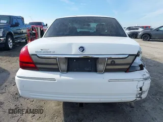 2009 Mercury Grand Marquis LS z VIN 2MEHM75V69X627304, wystawiony jako IAAI lot #41623041 z przebiegiem 137 970 mil mil oraz . Historia ofert i sprzedaży dostępna na DreamBid. Obrazek 16.