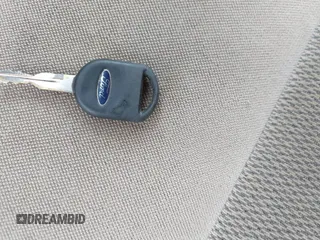 2004 Ford Taurus SE z VIN 1FAFP53U74A135287, wystawiony jako IAAI lot #40756396 z przebiegiem 141 483 mil mil oraz . Historia ofert i sprzedaży dostępna na DreamBid. Obrazek 11.