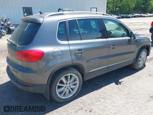 2013 Volkswagen Tiguan SE z VIN WVGBV7AX1DW006709, wystawiony jako IAAI lot #42388899 z przebiegiem 150 903 mil mil oraz . Historia ofert i sprzedaży dostępna na DreamBid. Obrazek 4.