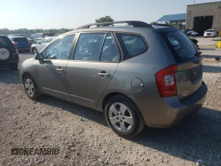 2009 Kia Rondo LX Base with VIN KNAFG528697282779, listed as a Copart auction lot 58926614 with 115,355 mi miles and Salvage Title. Bid and sale history available at carsss.com. Image 2.