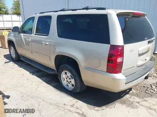 2012 Chevrolet Suburban LT with VIN 1GNSCJE03CR128206, listed as a IAAI auction lot 42002119 with 329,078 mi miles. Bid and sale history available at carsss.com. Image 3.