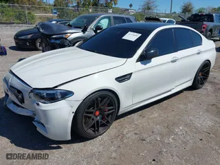 2013 BMW M5 with VIN WBSFV9C58DC772878, listed as a IAAI auction lot 41775691 with NaN miles. Bid and sale history available at carsss.com. Image 17.