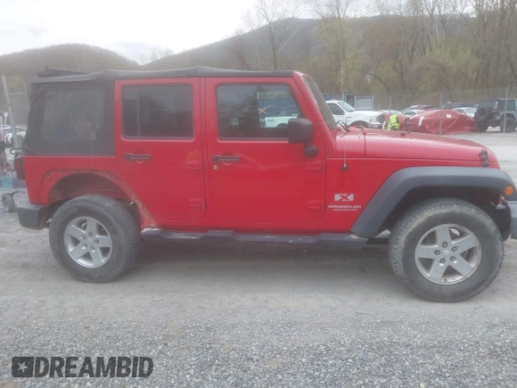 2008 Jeep Wrangler Unlimited X with VIN 1J8GA39128L562347, listed as a IAAI auction lot 41912669 with 106,040 mi miles and . Bid and sale history available at carsss.com. Image 14.