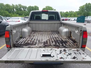 2001 Nissan Frontier XE z VIN 1N6DD26SX1C318540, wystawiony jako IAAI lot #42361846 z przebiegiem 286 072 mil mil oraz . Historia ofert i sprzedaży dostępna na DreamBid. Obrazek 13.