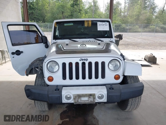 2012 Jeep Wrangler Unlimited Sahara with VIN 1C4BJWEG7CL275883, listed as a IAAI auction lot 42510764 with 149,531 mi miles and . Bid and sale history available at DreamBid. Image 13.