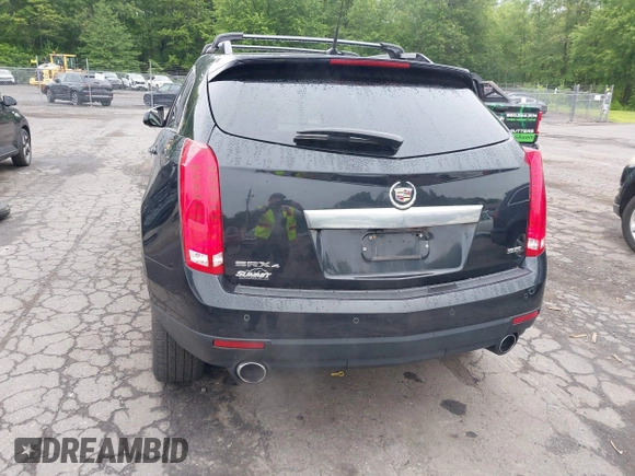 2013 Cadillac SRX Performance Collection z VIN 3GYFNHE39DS642111, wystawiony jako IAAI lot #42470291 z przebiegiem 176 239 mil mil oraz . Historia ofert i sprzedaży dostępna na DreamBid. Obrazek 16.
