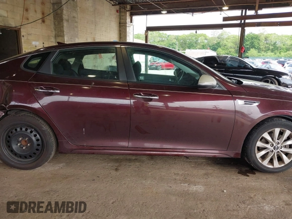 2016 Kia Optima LX with VIN 5XXGT4L32GG021055, listed as a IAAI auction lot 42424285 with 285,318 mi miles and . Bid and sale history available at DreamBid. Image 13.