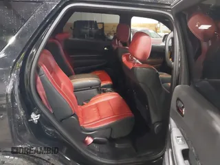 2023 Dodge Durango SRT Hellcat Premium z VIN 1C4SDJH90PC596225, wystawiony jako IAAI lot #41600943 z przebiegiem 18 877 mil mil oraz . Historia ofert i sprzedaży dostępna na DreamBid. Obrazek 8.