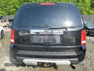 2011 Honda Pilot Touring z VIN 5FNYF4H92BB090512, wystawiony jako Copart lot #57046015 z przebiegiem 159 814 mil mil oraz Szkoda całkowita • Salvage title. Historia ofert i sprzedaży dostępna na DreamBid. Obrazek 6.