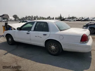 2007 Ford Crown Victoria LX with VIN 2FAFP74V47X119952, listed as a Copart auction lot 71025704 with 220,034 mi miles and Salvage Title. Bid and sale history available at carsss.com. Image 2.