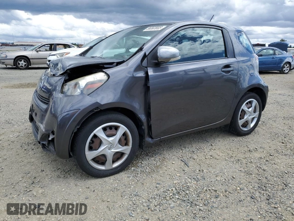 2012 Scion iQ z VIN JTNJJXB06CJ009187, wystawiony jako Copart lot #56563665 z przebiegiem 105 014 mil mil oraz Szkoda całkowita • Salvage title. Historia ofert i sprzedaży dostępna na DreamBid. Obrazek 1.