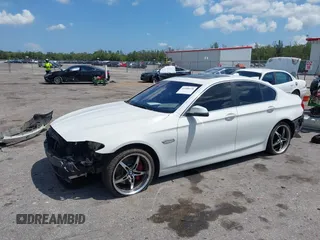 2014 BMW 5 Series 535i xDrive with VIN WBA5B3C56ED536747, listed as a IAAI auction lot 41900220 with 132,757 mi miles and . Bid and sale history available at carsss.com. Image 2.