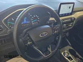 2021 Ford Escape SEL Hybrid with VIN 1FMCU9CZ1MUB25597, listed as a IAAI auction lot 42663573 with 79,061 mi miles and . Bid and sale history available at DreamBid. Image 11.