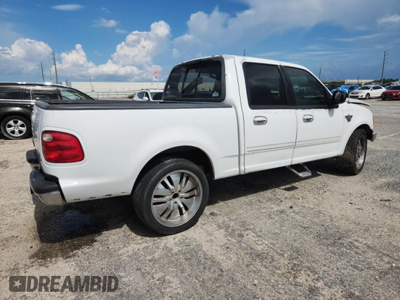 2001 Ford F-150 XLT with VIN 1FTRW07W71KE61878, listed as a Copart auction lot 60516665 with Not provided miles and Salvage title. Bid and sale history available at DreamBid. Image 3.
