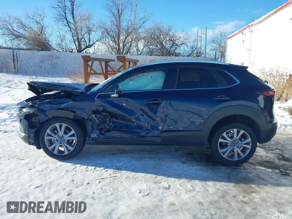 2022 Mazda CX-30 S Select with VIN 3MVDMBBL9NM448264, listed as a IAAI auction lot 41294686 with 9,324 mi miles and . Bid and sale history available at DreamBid. Image 14.