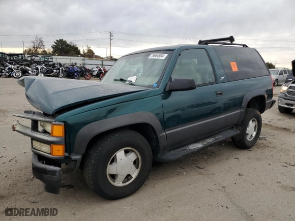 1998 Chevrolet Tahoe with VIN 3GNEK18R4WG128424, listed as a Copart auction lot 79684984 with 217,456 mi miles and Salvage Title. Bid and sale history available at carsss.com. Image 1.