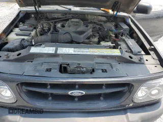 2000 Ford Explorer Sport with VIN 1FMYU60E8YUB03494, listed as a Copart auction lot 59266395 with 210,925 mi miles and Salvage title. Bid and sale history available at DreamBid. Image 12.