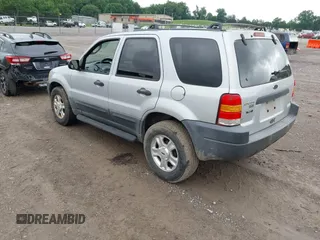 2003 Ford Escape XLT Popular z VIN 1FMYU03193KB02834, wystawiony jako IAAI lot #42423365 z przebiegiem 350 065 mil mil oraz . Historia ofert i sprzedaży dostępna na DreamBid. Obrazek 3.