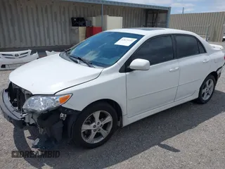 2011 Toyota Corolla L with VIN 2T1BU4EE8BC714122, listed as a IAAI auction lot 42073121 with 221,176 mi miles. Bid and sale history available at carsss.com. Image 2.