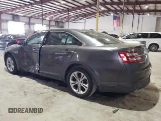 2017 Ford Taurus SEL with VIN 1FAHP2E82HG124014, listed as a Copart auction lot 47630015 with 136,099 mi miles and Salvage Title. Bid and sale history available at DreamBid. Image 2.
