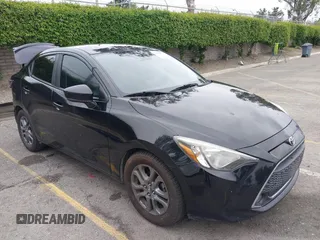 2019 Toyota Yaris L z VIN 3MYDLBYV2KY524586, wystawiony jako IAAI lot #42030527 z przebiegiem 106 531 mil mil oraz . Historia ofert i sprzedaży dostępna na DreamBid. Obrazek 1.