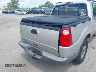 2005 Ford Explorer Sport Trac XLS z VIN 1FMZU77K15UB67801, wystawiony jako IAAI lot #42822163 z przebiegiem 179 102 mil mil oraz . Historia ofert i sprzedaży dostępna na DreamBid. Obrazek 6.