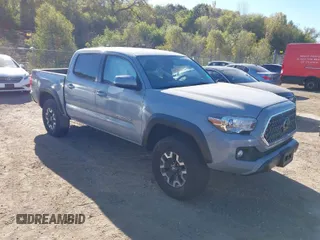 2019 Toyota Tacoma SR z VIN 3TMCZ5AN3KM232313, wystawiony jako IAAI lot #40492571 z przebiegiem 83 516 mil mil oraz . Historia ofert i sprzedaży dostępna na DreamBid. Obrazek 1.