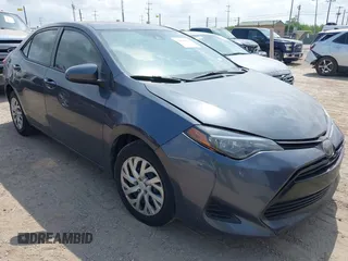 2019 Toyota Corolla L z VIN 5YFBURHE7KP948955, wystawiony jako IAAI lot #42046123 z przebiegiem 98 352 mil mil oraz . Historia ofert i sprzedaży dostępna na DreamBid. Obrazek 1.