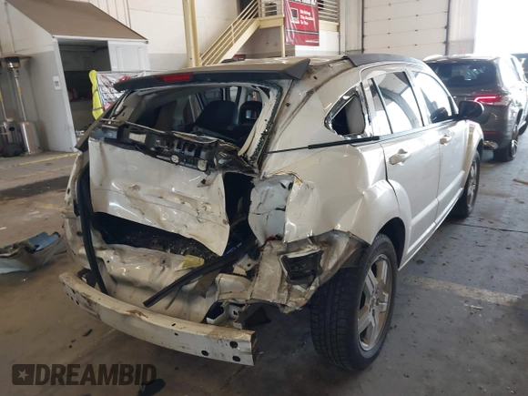 2009 Dodge Caliber SXT with VIN 1B3HB48A89D116734, listed as a IAAI auction lot 41959281 with 209,136 mi miles and . Bid and sale history available at DreamBid. Image 6.