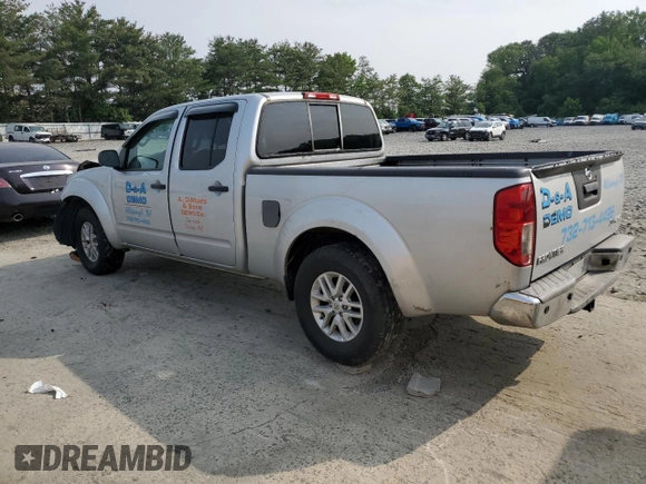 2014 Nissan Frontier SV with VIN 1N6AD0FV1EN734214, listed as a Copart auction lot 59261715 with 114,413 mi miles and Salvage title. Bid and sale history available at DreamBid. Image 2.